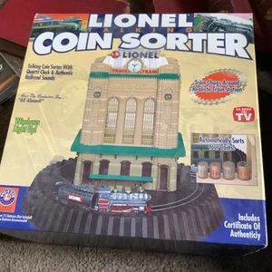 Lionel Talking Light Up selezionatore di monete animato - nuovo con certificato di autenticità Emson 7407 nuovo con scatola - Foto 1 di 4