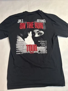 Camisa Tour Jay Z & Beyoncé Rap “On The Run” 2014 Manga Corta Talla Mediana Negra - Imagen 1 de 10