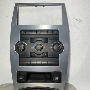 2008-2010 Jeep Commander Front Temperature Climate Control w/ Radio Bezel - Picture 1 of 2