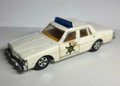 De colección Ertl 1980 Pontiac Bonneville Dukes Of Hazzard Sheriff Difícil de Encontrar Barra de Luz Azul Foto 1 de 4
