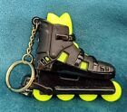 Porte-clés vintage lame à roulettes noire et jaune patin à roulettes roues tournantes