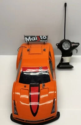 Maisto Tech Orange Remote Controlled Car - Image 1 of 3