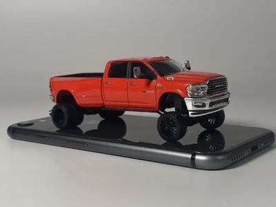 I/64 Customized / Lifted Dodge Ram 3500 Dually Diecast Model Toy Pickup Truck - Image 1 of 4