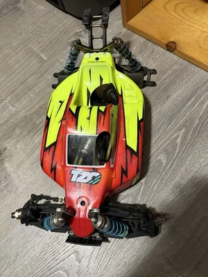 Kyosho Inferno MP9 TKI4 .21 1/8 Nitro Buggy Roller  - Image 1 of 2