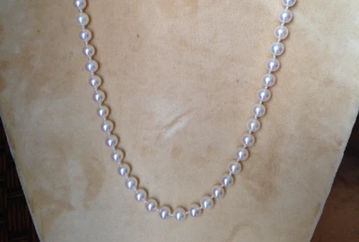 "Collar de perlas vintage Mikimoto 19,75"" 7 mm 18kt en bolsa de gamuza crema" Foto 1 de 4