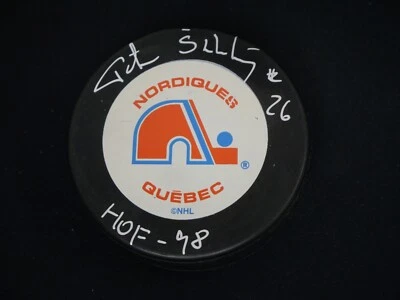 PETER STASTNY SIGNED QUEBEC NORDIQUES TEAM PUCK INSCRIBED "HOF-98" WITH JSA COA - Image 1 of 2