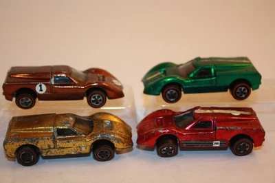 4 Hot Wheels 1967 Ford J-Car Redline Cars Green / Rose Red / Brown / Olive - Image 1 of 4
