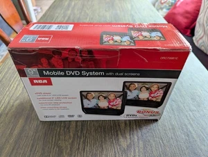 RCA 9” Double Play Mobile DVD System DRC79981E Dual Screen Mobile DVD System NIB - Picture 1 of 7