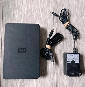 Disque dur externe Western Digital 1 To WDBAAU0010HBK-01 avec alimentation et câble USB - Photo 1/8