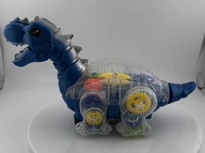 Equipo musical para caminar Dino iluminado juguete de dinosaurio DT-524 azul transparente - Imagen 1 de 10
