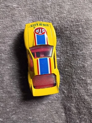 Matchbox 1985 amarillo Pontiac Firebird Racer STP hijo de una pistola en muy buena condición forma Macao #60 Foto 1 de 4