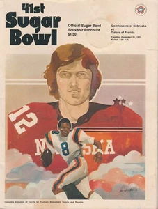 Gator Bowl 1974 Nebraska vs Florida NCAA programa de fútbol incluye moneda - Imagen 1 de 2