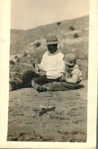 Cowboy Father and Son First Rabbit Hunt Antique RPPC Photo Postcard - Picture 1 of 2