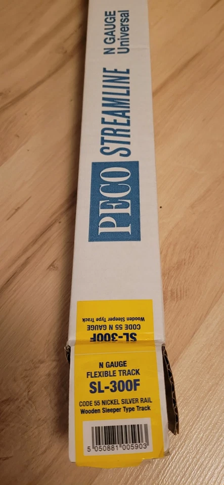 Peco SL300F  10 Stück Flexgleis m. Holzschwellen Code 55 Länge: 914 mm unbenutzt - Bild 1 von 2