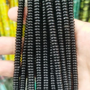 Cuentas espaciadoras de disco Rondelle Heishi de piedra negra natural de 2x6 mm para hacer joyas - Imagen 1 de 4