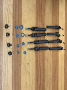 Traxxas Ultimate Slash 4X4 VXL Front/Rear Driveshafts Axles Hex Nuts new bearing - Picture 1 of 1