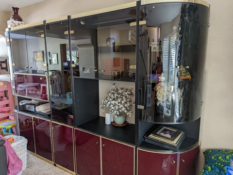 Beautiful burgundy/black/gold China Cabinet perfect for showcasing valuables! Cover