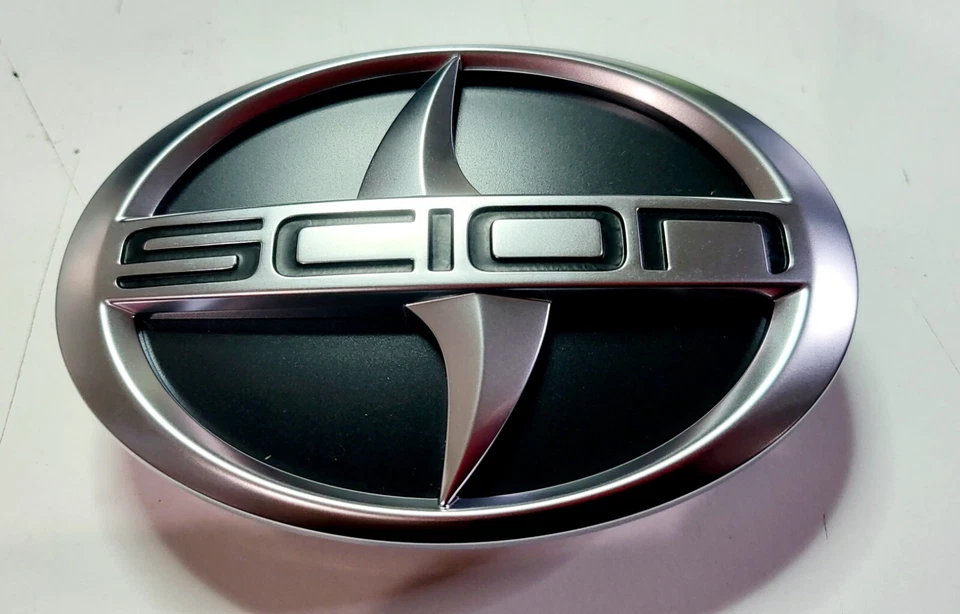 11-14 SCION TC FRONT EMBLEM GRILLE MOUNTED 2011 2012 2013 2014 - Image 1 of 1