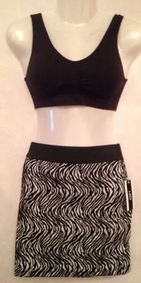 Falda corta elástica negra con estampado de animales A.Byer Junior para mujer talla L y XL PRECIO DE VENTA SUGERIDO POR EL FABRICANTE $36 Foto 1 de 4