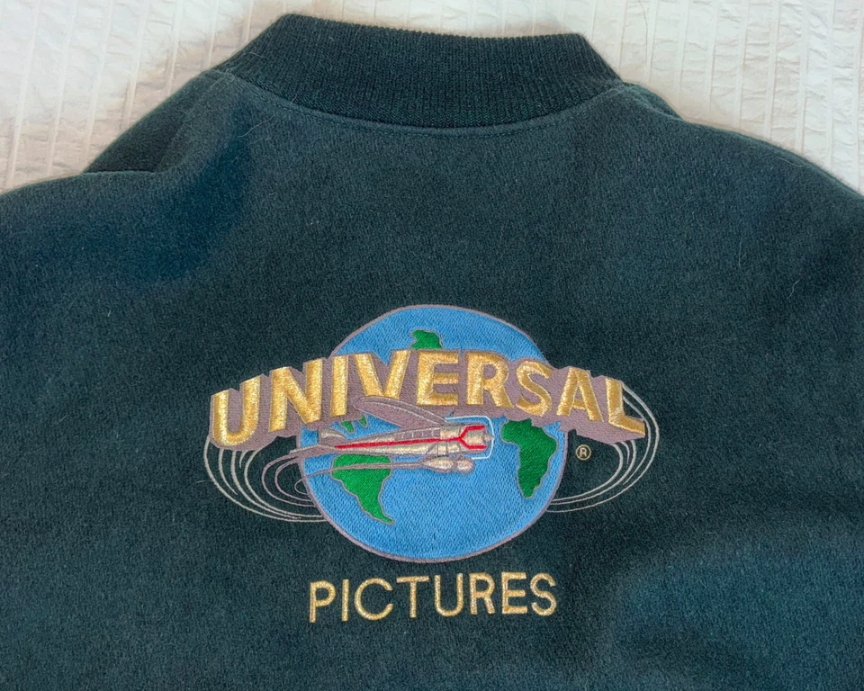 Chaqueta de bombardero de cuero de lana verde universitaria UNIVERSAL STUDIOs vintage para hombre (grande) Foto 1 de 4