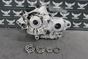 1999 SUZUKI RM125 OEM LEFT ENGINE MOTOR CRANKCASE CRANK CASE BOTTOM END - Picture 1 of 11