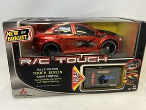 New Bright Mitsubishi Lancer Evolution 1/16 RC Touch R/C Car Remote Control Evo - Picture 1 of 7
