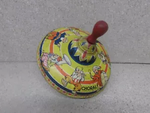 VINTAGE WYANDOTTE TOYS BANDA NANI CORALI METALLO LATTA TROTTOLA GIOCATTOLO MADE IN USA - Foto 1 di 4