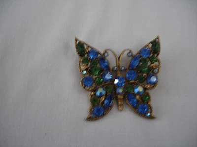 VTG.COSTUME JEWELRY,UNSIGNED GOLDTONE BLUE & GREEN RHINESTONE BUTTERFLY BROOCH - Image 1 of 2
