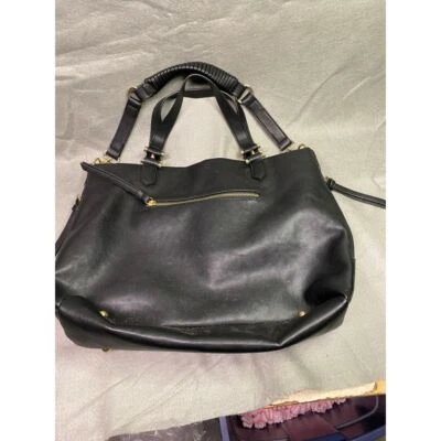 Bolso de Mano INC Elegante Negro Usado con Forro Estampado Único y Acentos Dorados Foto 1 de 4