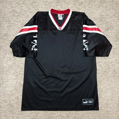 Camiseta de fútbol americano Puma grande CFL negra rara vintage estampada Calgary Foto 1 de 4