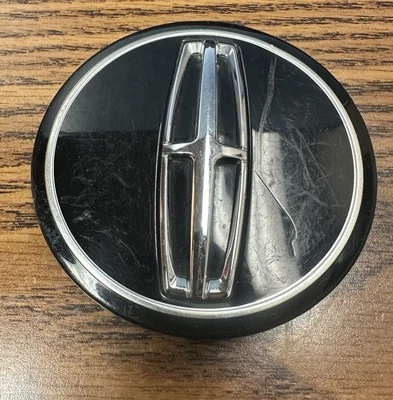 Tapa central Lincoln Navigator OEM 2015-2021 NEGRA FL74-1A096-AA #10024 Foto 1 de 4