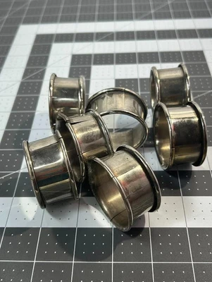 Anillos de servilletas ranurados de acero inoxidable cantidad 7 Foto 1 de 4