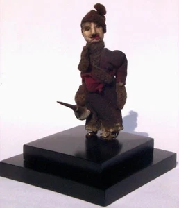 Man with oil can from an extraordinary collection of hand carved figures. - Picture 1 of 8