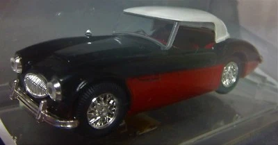 AUSTIN HEALEY 1:43 BLACK RED PAINT WHITE TOP WIRES IN DISPLAY CASE AUSTIN HEALEY - Image 1 of 4