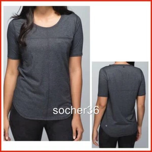 CAMISETA LULULEMON RUNAWAY NEGRA JASPEADA TALLA 6 CON BOLSA DE REGALO NUEVA CON ETIQUETAS $68 - Imagen 1 de 10