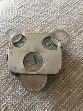 Vintage Metal Coin Holder With 3 Coins.
