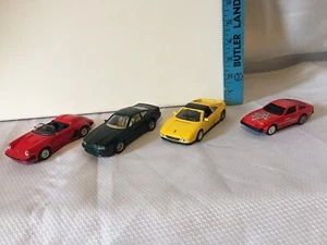MC Toys Lote de 4 Coches de Juguete Diecast Ferrari, Aston Martin, Nissan, Porsche - Imagen 1 de 12