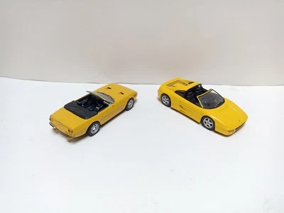 2 Modellini Ferrari MINICHAMPS E HOT WHEELS | Daytona Spider, 355GTS | 1:43 - Immagine 1 di 4