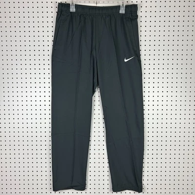Pantalones de chándal Nike para hombre grandes negros tejidos para equipo pantalones de entrenamiento 824408 060 nuevos con etiquetas Swoosh Foto 1 de 4