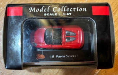Malibu International Model Collection 1:87 Porsche Carrera GT Rojo Foto 1 de 3