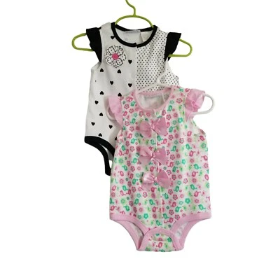 Lote de 2 bodys mameluco bebé primeras impresiones blanco y negro/rosa y verde 12 M Foto 1 de 4