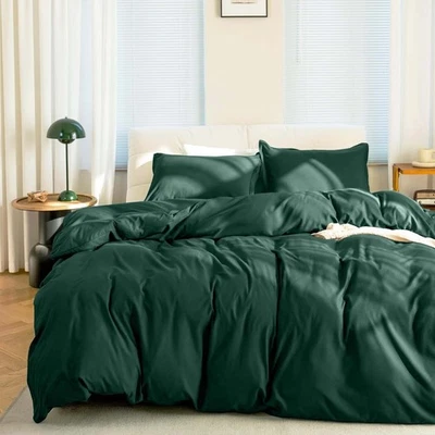 Juegos de funda nórdica reversible de textura suave de calidad de hotel Foto 1 de 4