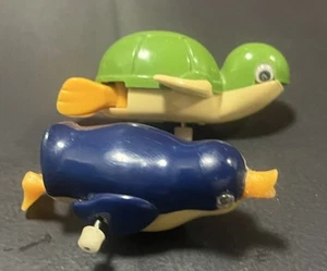 Vintage 1977 TOMY Singapore Wind-Up Swimming Turtle And Penguin Bath Toys - Picture 1 of 12