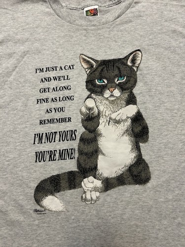 Gray adult T-shirt with black and white cat image, blue eyes, and text “I’m just a cat and we’ll get along fine as you remember.”