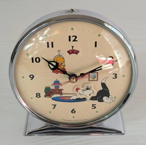 VINTAGE WARNER BRO 1994 SYLVESTER & TWEETY BIRD ANIMATED METAL CLOCK WITH ALARM - Picture 1 of 7