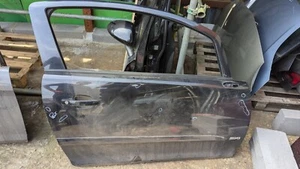 VAUXHALL CORSA D 3 PUERTAS PUERTA DELANTERA DERECHA LADO CONDUCTOR EN NEGRO (SIN ESPEJO) - Imagen 1 de 4