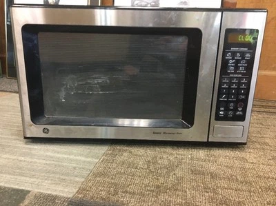 GE 1.6 CU. FT. CAPACITY COUNTERTOP MICROWAVE OVEN - Image 1 of 3