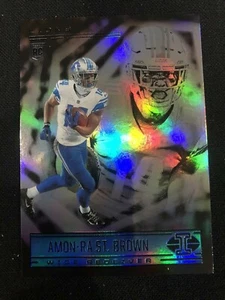 Amon-Ra St. Brown 2021 Panini Illusioni RC Leoni - Foto 1 di 2