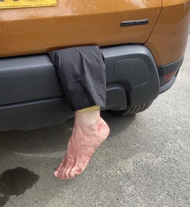 HALLOWEEN LIFE SIZE SEVERED BODY PARTS PROP JOKE FAKE LEG FOOT PROP TRAPPED - Picture 1 of 5