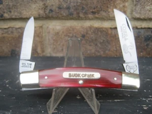 BUCK CREEK SOLINGEN GERMANY RED CELLULOID SWIRL HALF CONGRESS COBRA POCKET KNIFE - Picture 1 of 11